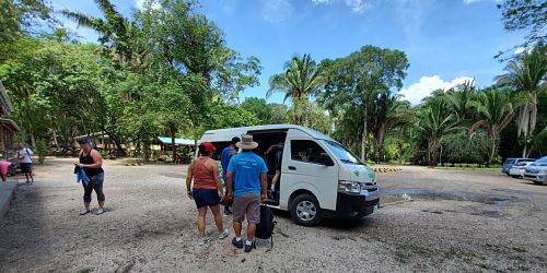 Passengers loading van image